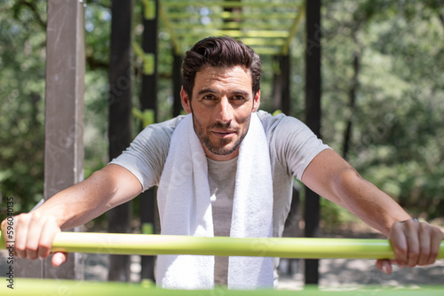 handsome guy relaxing after outdoor workout