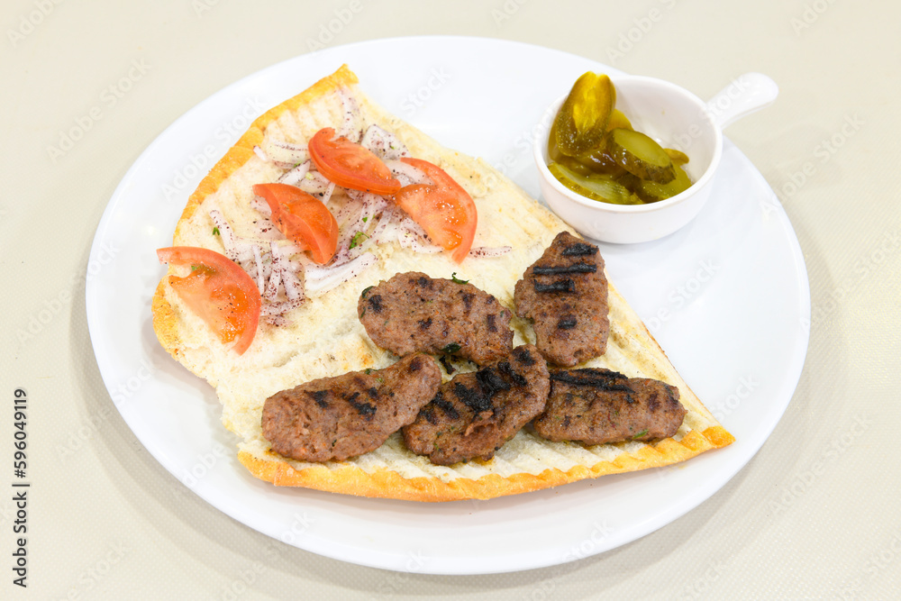 Meatball between bread (Turkish name : ekmek arasi kofte ). Izgara kofte