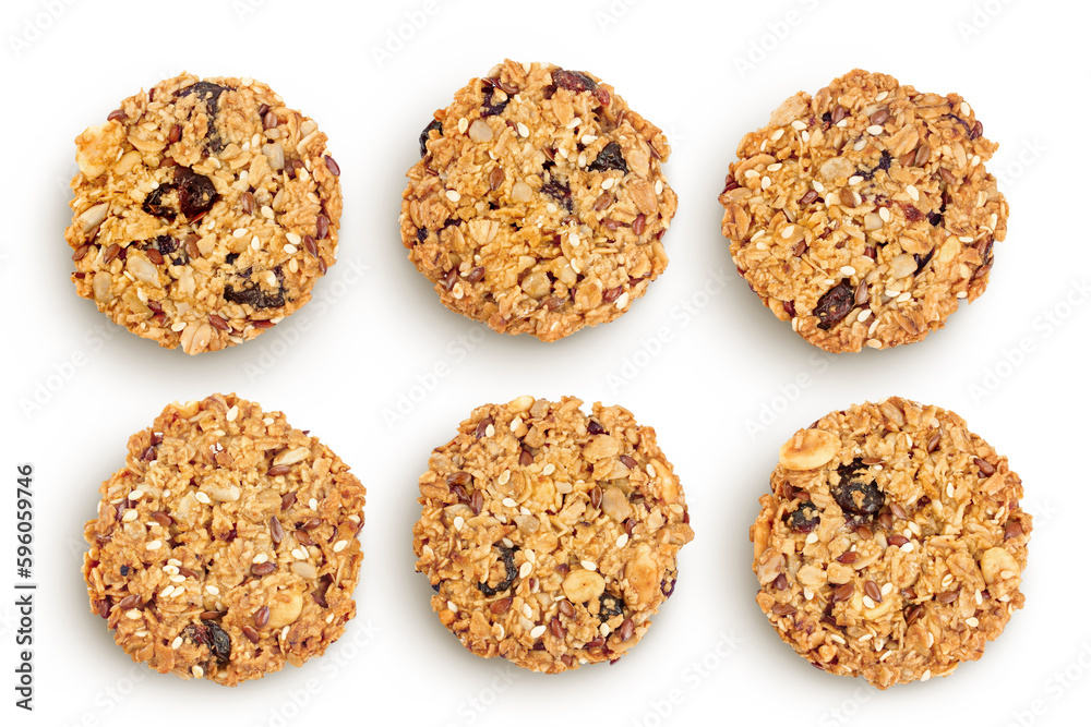 Granola cookie in ceramic bowl isolated on white background with full depth of field. Top view. Flat lay.