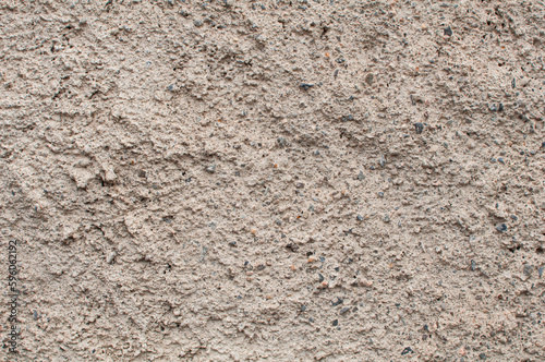 Rugged cement wall background with rough and detailed texture.