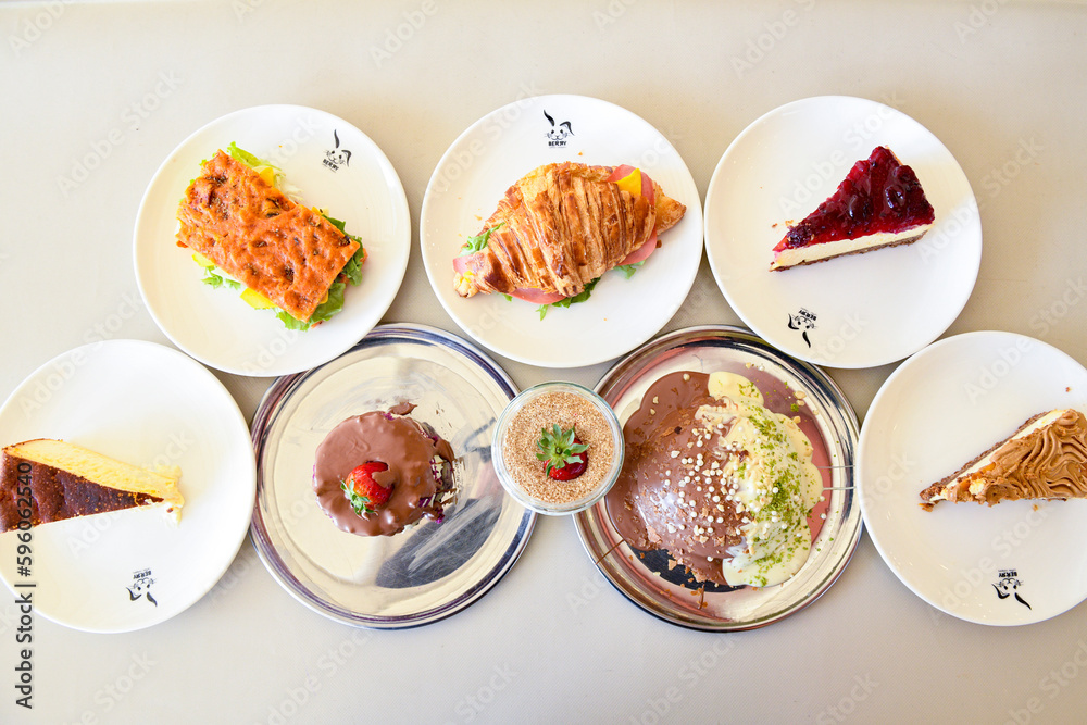 Table scene of assorted take out or delivery foods. Traditional Turkish cuisine. Various Turkish meal and appetizers. Top down view on a table.