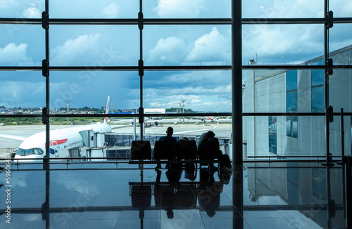 Silhouette of Passengers Waiting for Flight in Guarulhos International Airport. Sao Paulo, Brazil