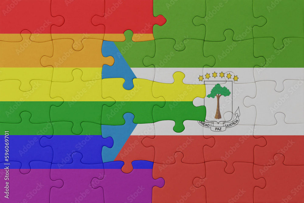puzzle with the flag of rainbow gay pride and equatorial guinea . macro.concept. puzzle with the flag of rainbow gay pride and equatorial guinea . macro.concept.