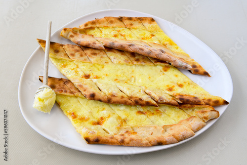 Kiymali pide. Turkish pide with minced meat. Turkish pizza mince pita Pide on white background. Etli ekmek. Kusbasili pide.