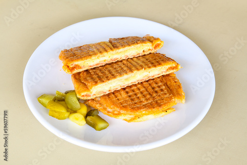 Turkish karisik atom Ayvalik tost ( kasarli bazlama tost) . Sucuklu, Kasarli, kavurmali karisik tost. Flat baked bread toasted