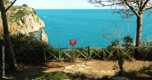 Danger sign on the rock no descent