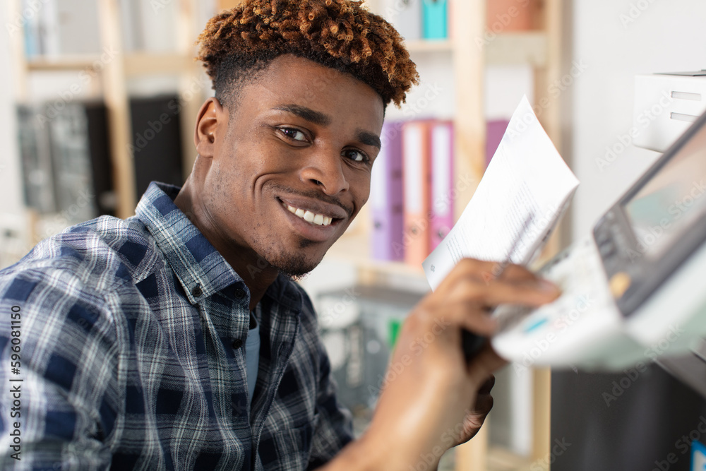 man reading instruction for 3d printer man reading instruction for 3d printer