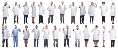 full length group of doctors showing badge isolated © ASDF