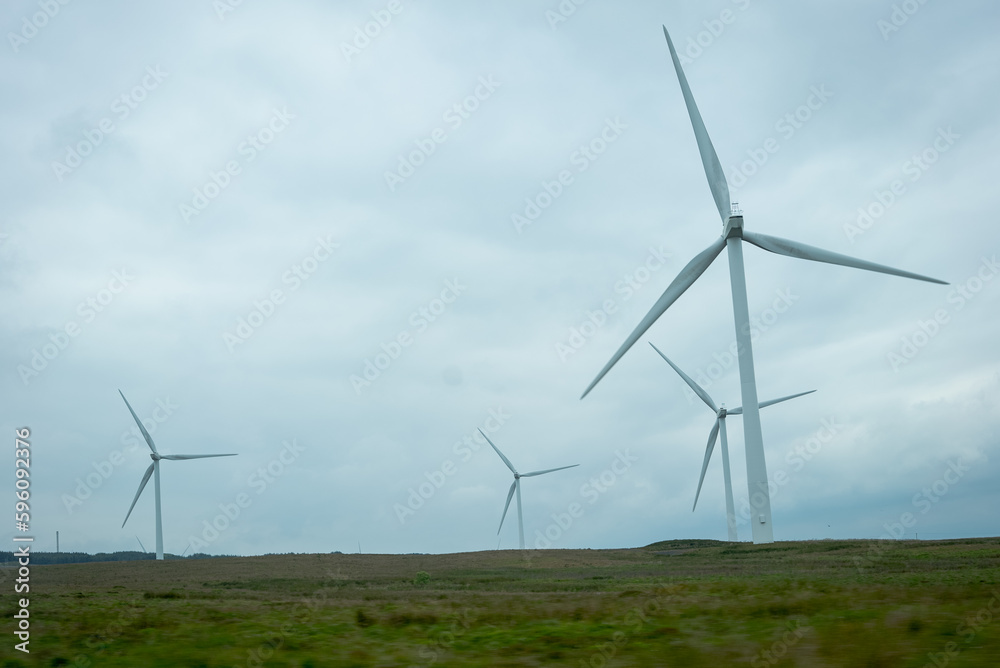 Wind turbine farm in a field in Scotland Wind turbine farm in a field in Scotland