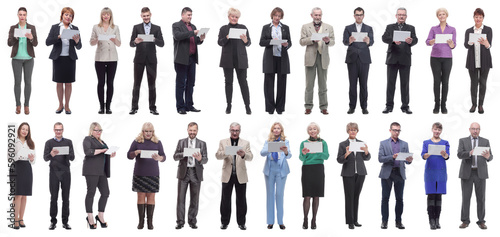 group of people holding tablet and looking into it