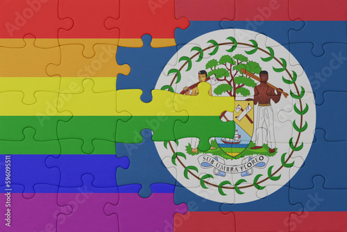 puzzle with the flag of rainbow gay pride and belize . macro.concept.