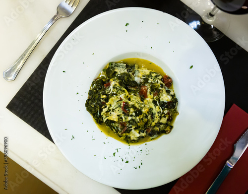 Image of stewed spinach with ham, dish of Catalan cuisine, nobody