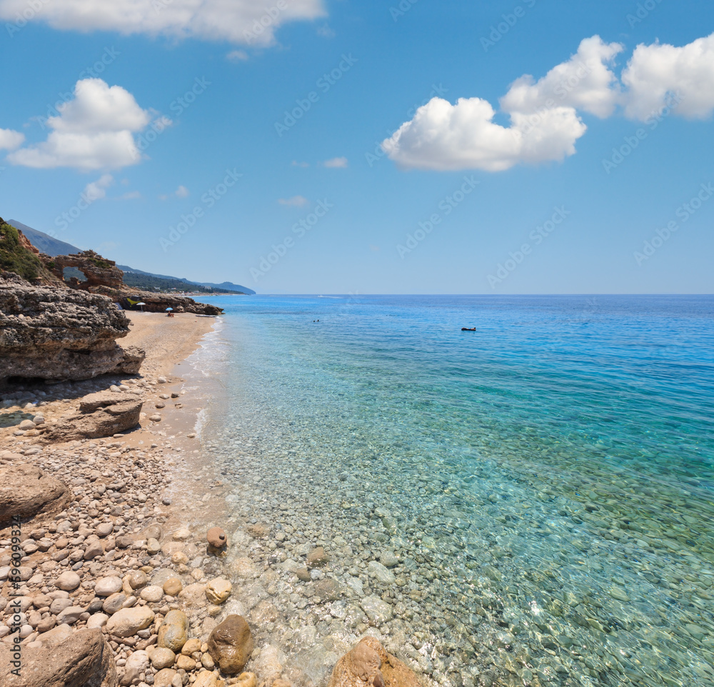 Drymades beach, Albania. Summer  Ionian sea coast view. People are unrecognizable.