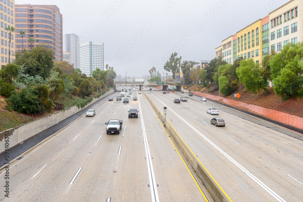 Traffic on a multi-lane freeway on a rainy autumn day Traffic on a multi-lane freeway on a rainy autumn day