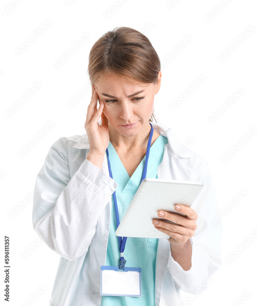 Tired doctor with tablet computer on white background Tired doctor with tablet computer on white background