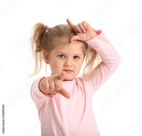 Funny little girl showing loser gesture on white background