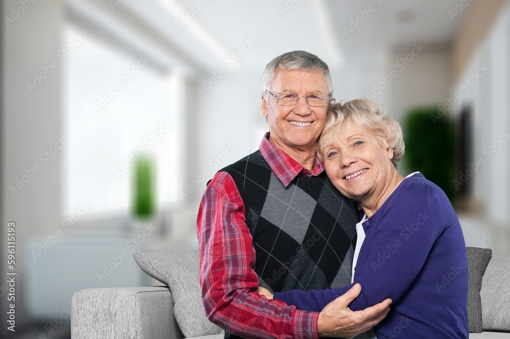 Loving old couple together on the sofa. Loving old couple together on the sofa.