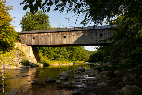 Old Road Bridge building over river
