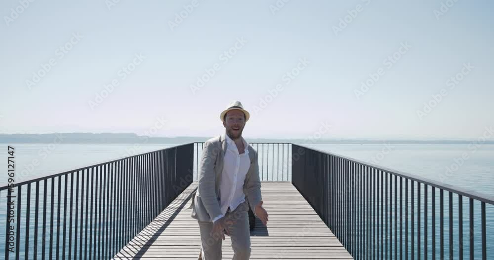 Happiness Lifestyle Portrait of Happy Male Person Enjoying Relaxing and Peaceful Life Looking at Lake Panorama View in Sunny Weather Happiness Lifestyle Portrait of Happy Male Person Enjoying Relaxing and Peaceful Life Looking at Lake Panorama View in Sunny Weather