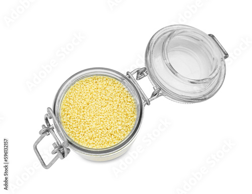 Glass jar of raw couscous isolated on white, top view