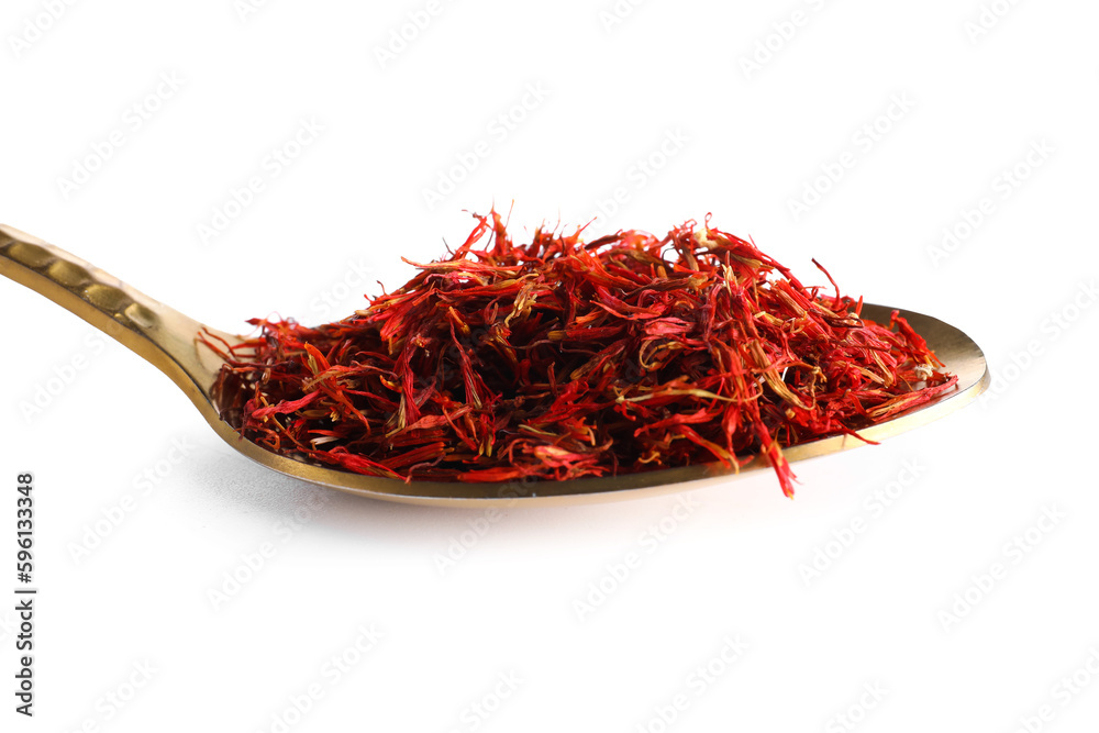 Fototapeta premium Spoon with pile of saffron on white background