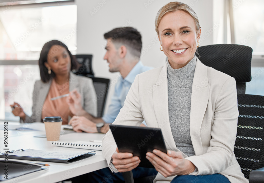 Your create new opportunities in business by working hard. a young business woman using a tablet in a meeting in a office. Your create new opportunities in business by working hard. a young business woman using a tablet in a meeting in a office.