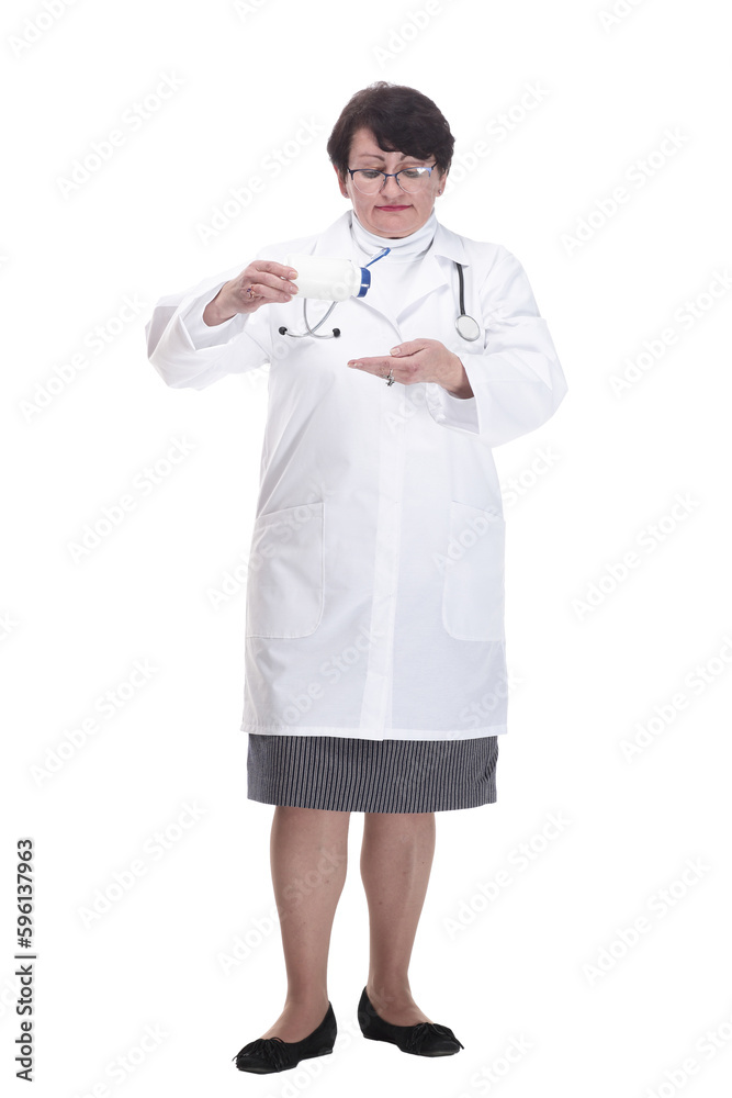 in full growth. senior female medic with sanitizer in hand.