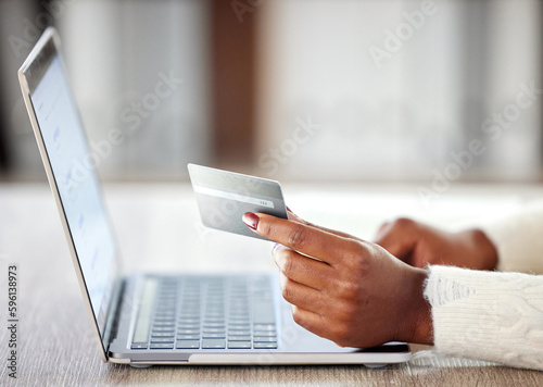 Fill your cart full of possibilities. an unrecognisable woman using a laptop and credit card while working at home.