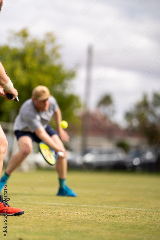 Obraz premium Tennis player playing a match, hitting a drop shot in Australia 