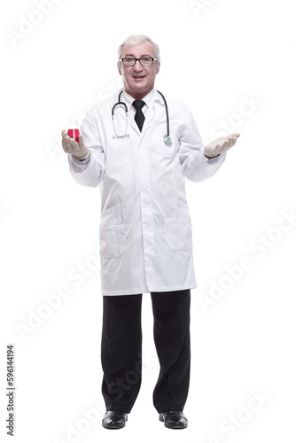 full-length. mature doctor with a laboratory flask in his hands .