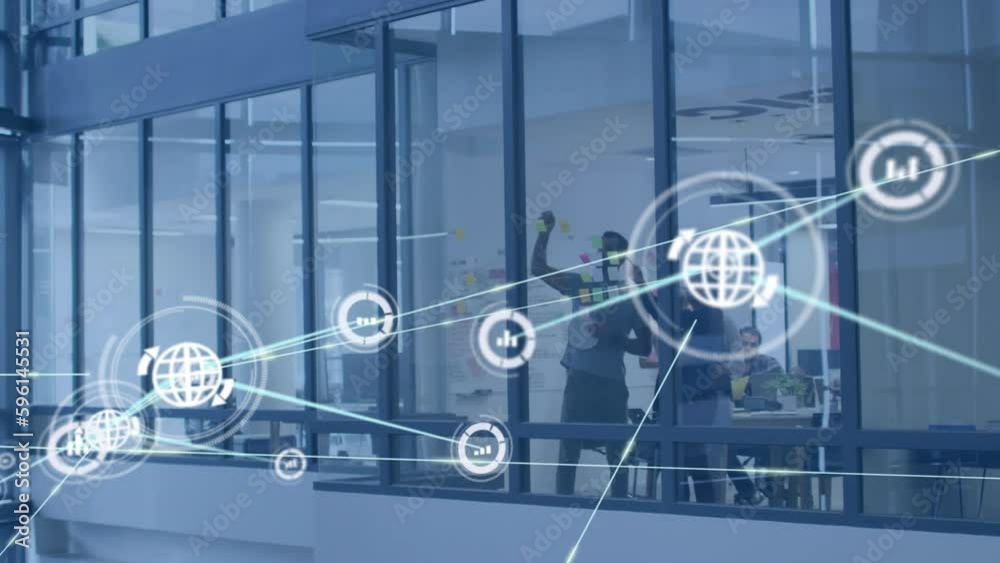 Animation of network of connections with icons over diverse business people in office Animation of network of connections with icons over diverse business people in office