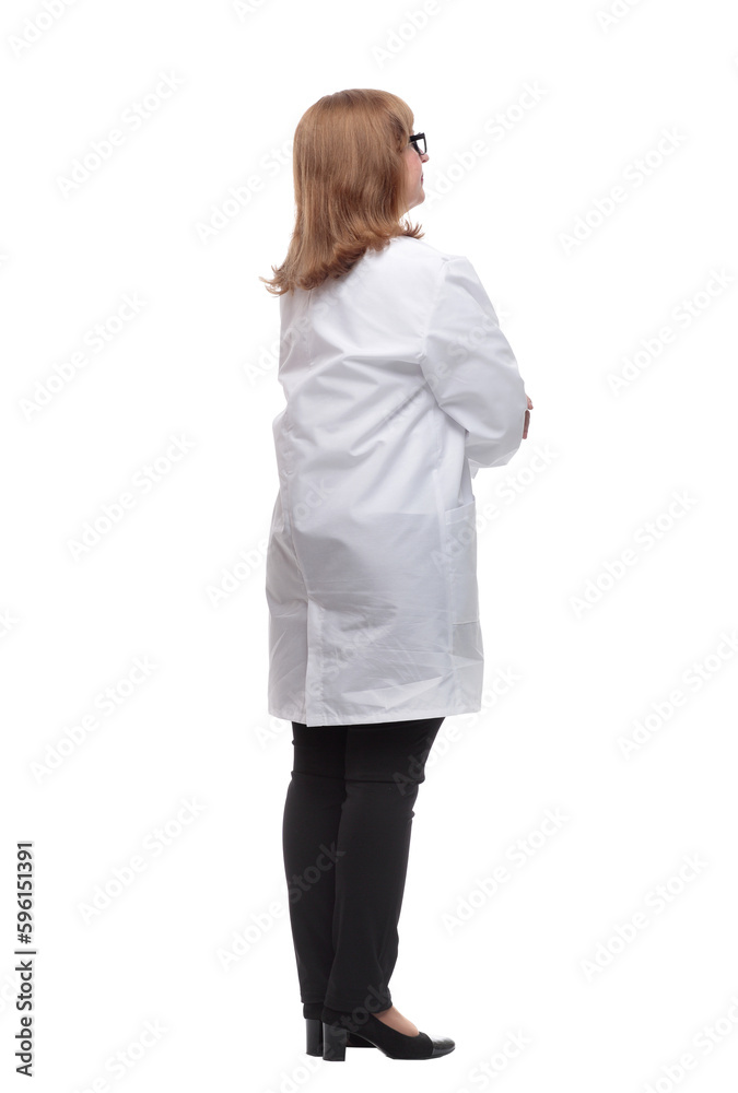 side view. serious female medic looking at a white screen