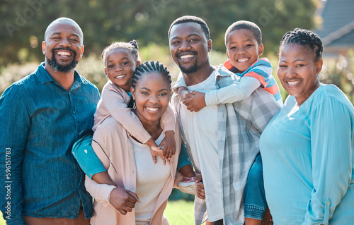 Home is wherever family is. a multi-generational family standing together outside. photo