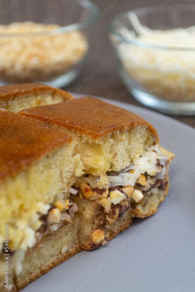 Martabak manis is a beloved Indonesian dessert that has become a popular treat around the world. This soft and fluffy pancake-like dish is filled with sweet fillings like chocolate, cheese or others