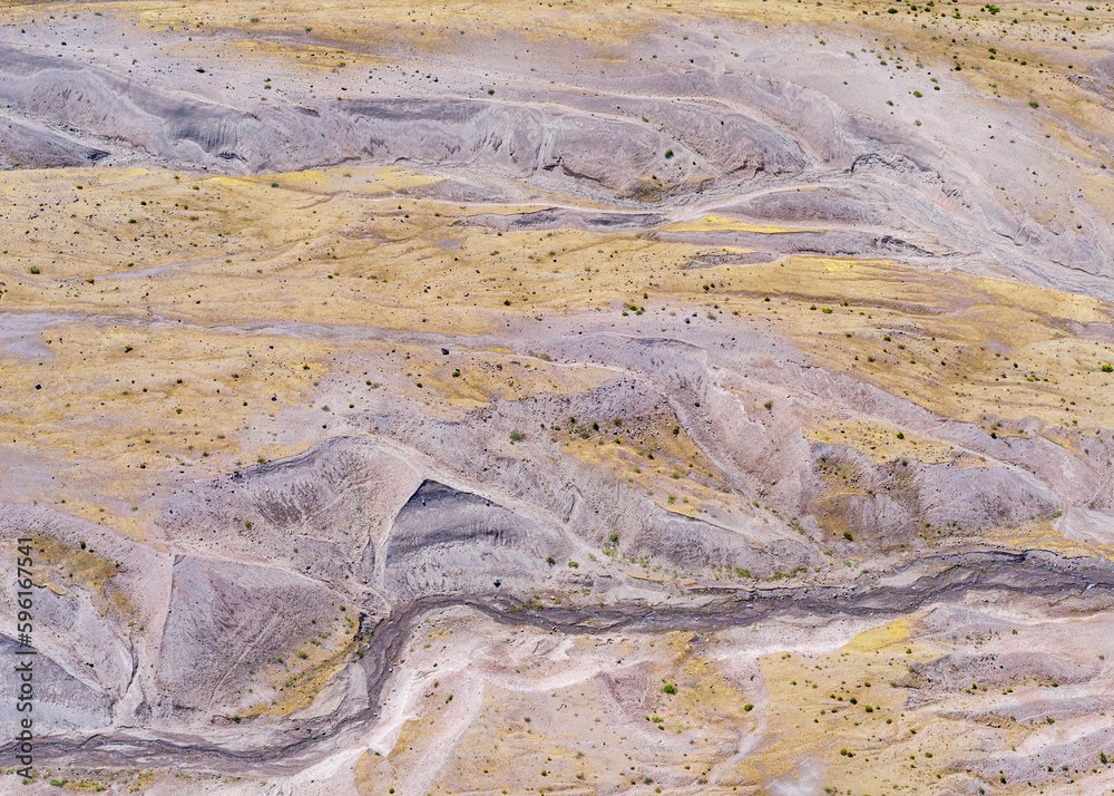 First-order stream channel erosion patterns on barren landscapes