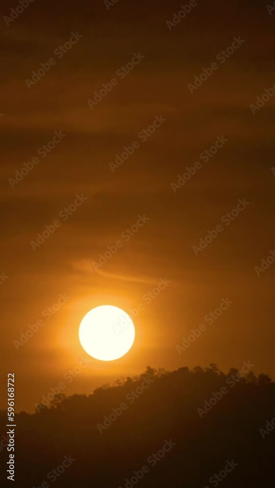 Timelapse of dramatic sunrise with orange sky in a sunny day. Timelapse of dramatic sunrise with orange sky in a sunny day.