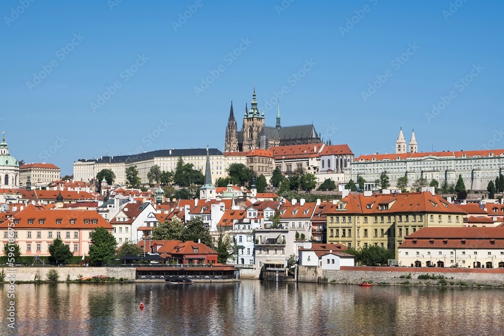 Cityscape with cathedral, castle, river and historic palaces along the Vltava river in Prague, Czech republic