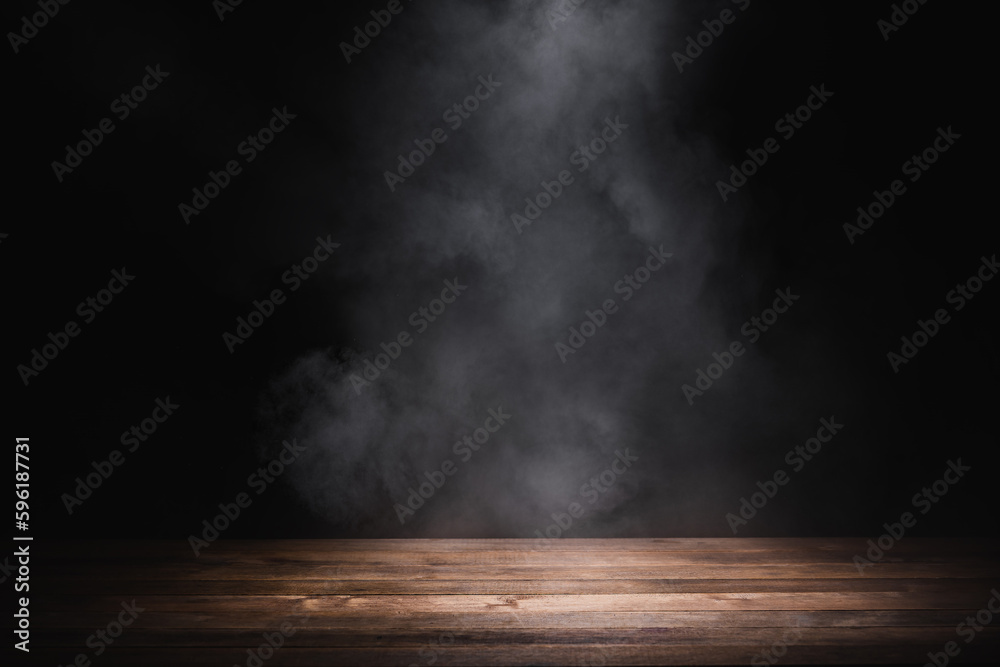 Creative interior concept. Abstract Dark room with smoke fog surrounding on wooden table background. Template for product presentation. Mock up 