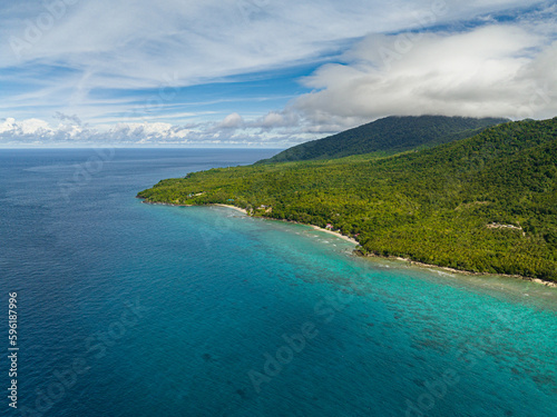 Aerial view of Weh island with jungle and blue sea. Aceh, Indonesia.