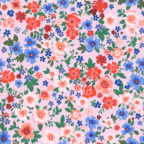 Seamless pattern. Vector flower design with cute wildflowers. Romantic abstract background. An illustration of spring nature with bright colors of red and blue.