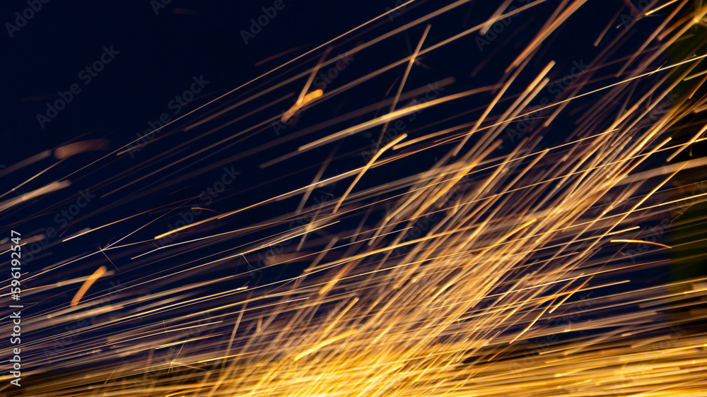 Grinding work with the formation of a plume of sparks Grinding work with the formation of a plume of sparks