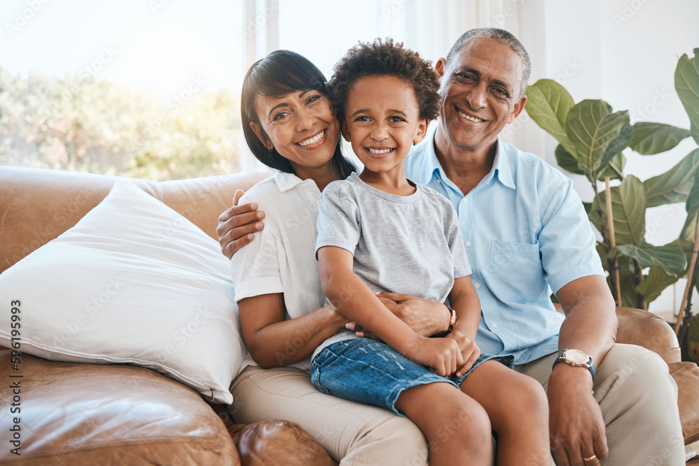 Portrait, grandparents and kid smile in home living room on sofa, bonding or having fun. Family, happiness or child with grandma and grandpa, care or enjoying quality time together on couch in lounge Portrait, grandparents and kid smile in home living room on sofa, bonding or having fun. Family, happiness or child with grandma and grandpa, care or enjoying quality time together on couch in lounge