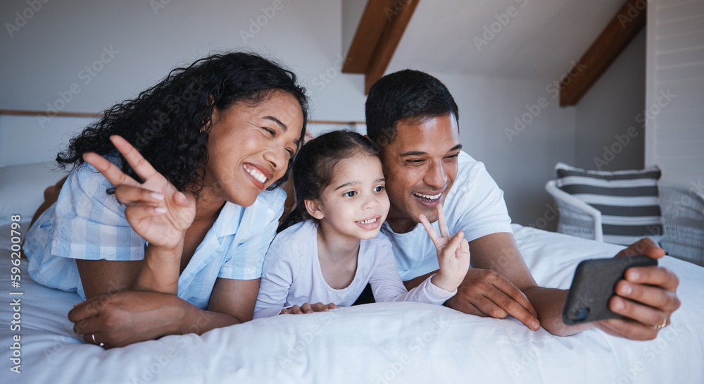 Family, smile and peace sign selfie in bedroom, bonding or having fun together on bed. Hand gesture, happiness or kid, mother and father taking photo for social media, happy memory or profile picture