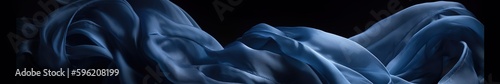 Indigo silk on black background, banner. 