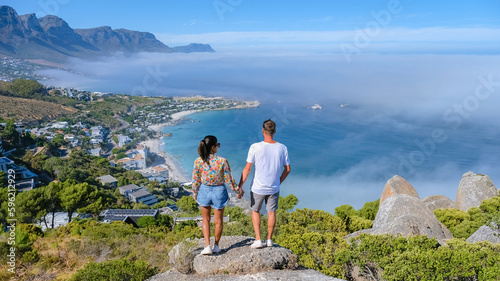 The Rock viewpoint in Cape Town, Camps Bay with fog over the ocean in Cape Town South Africa