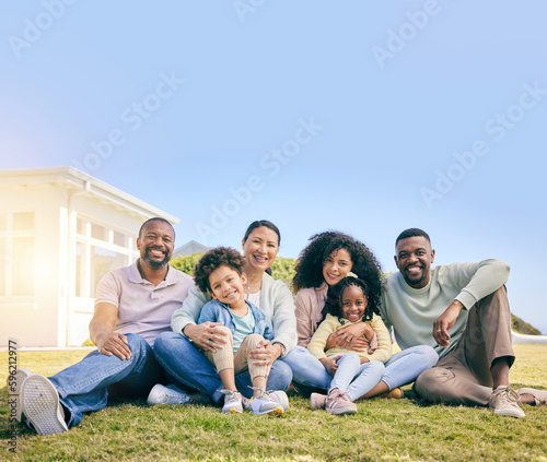 Family, portrait and generations, relax on grass with happiness, grandparents and parents with children. Happy people outdoor, mockup and summer, sitting on lawn with love and bonding at holiday home