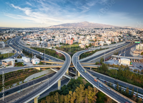 Aerial panoramic view of multilevel junction highway road interchange section as seen in National Road motorway, Athens, Greece © moofushi
