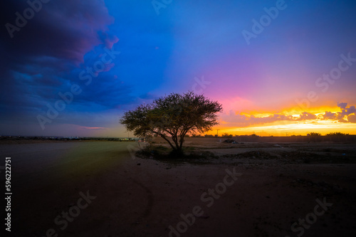 Beautiful cloudy sunset on desert