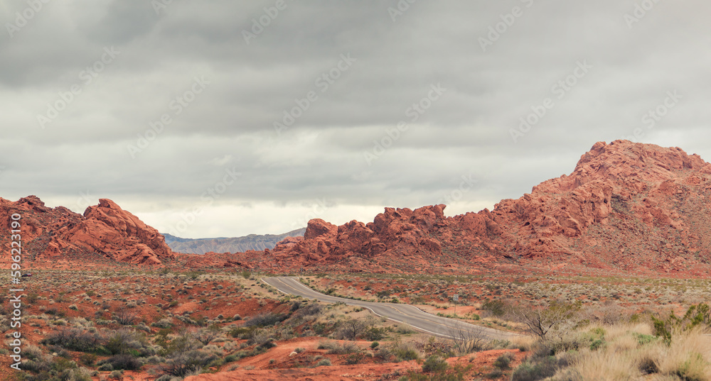 Along the breathtaking panoramic road through the Valley of Fire State Park near Las Vegas in Nevada, USA. Surrounded by rocks and beautiful scenery. Along the breathtaking panoramic road through the Valley of Fire State Park near Las Vegas in Nevada, USA. Surrounded by rocks and beautiful scenery.
