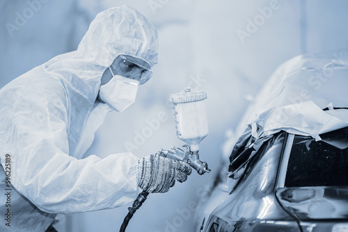 Photography car painting with high detail paint professional quality work in garage auto color repair workshop vintage color tone